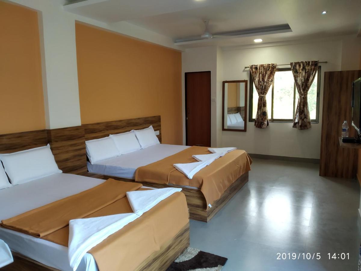 Lotus Hotel Nagaon Beach Алібаґ Екстер'єр фото
