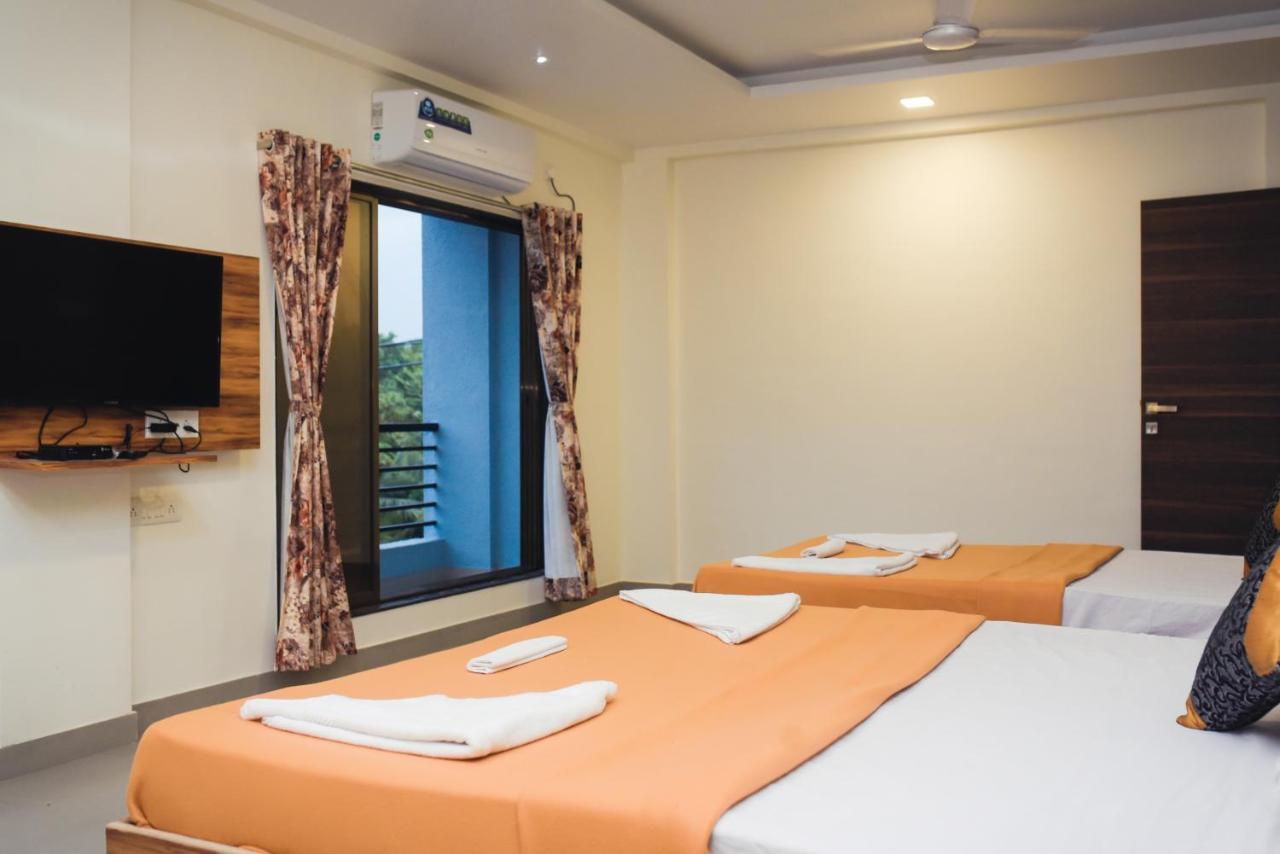 Lotus Hotel Nagaon Beach Алібаґ Екстер'єр фото